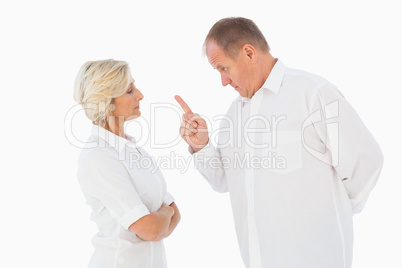 Angry man pointing at his partner