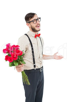 Geeky hipster offering bunch of roses