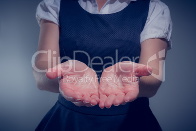 Businesswoman presenting your product with hands