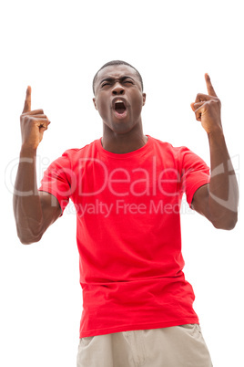 Excited football fan in red cheering