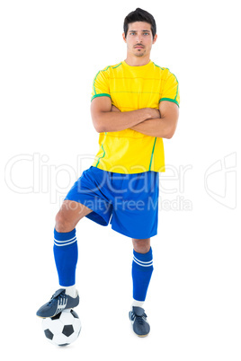 Football player in yellow with ball