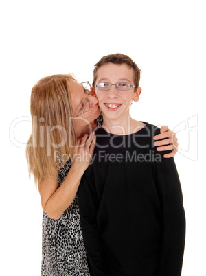 Mother kisses her son.