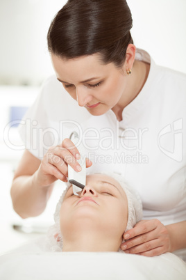 Ultrasonic facial cleaning at beauty treatment salon