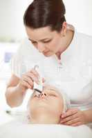 Ultrasonic facial cleaning at beauty treatment salon