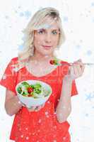 Composite image of young blonde woman eating a vegetable salad