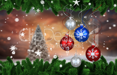 Composite image of digital hanging christmas bauble decoration