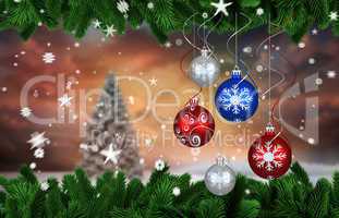 Composite image of digital hanging christmas bauble decoration