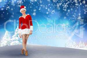 Composite image of pretty santa girl smiling at camera