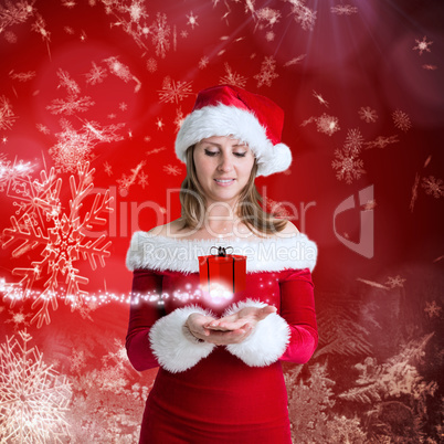 Composite image of pretty girl in santa outfit