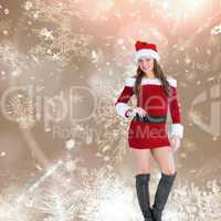 Composite image of sexy santa girl smiling at camera