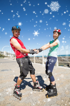 Composite image of fit mature couple rollerblading on the pier