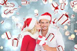 Composite image of young festive couple