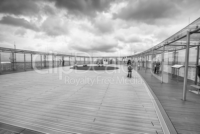 PARIS - JUNE 18, 2014: Tourists enjoy city view from the top of