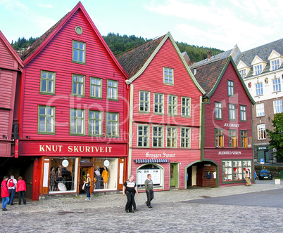 BERGEN, NORWAY - JULY 24, 2007: Tourists along city streets. The