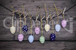 Many Colorful Easter Eggs Hanging On Line  With Frame