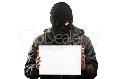 Criminal man in balaclava or mask covering face holding blank wh
