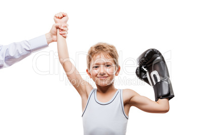 Smiling boxing champion child boy gesturing for victory triumph