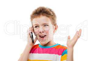 Amazed and surprised child boy talking mobile phone or smartphon