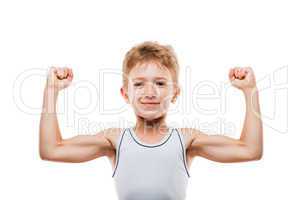 Smiling sport child boy showing his hand biceps muscles strength