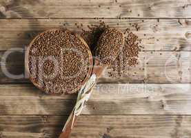 wooden bowl of buckwheat