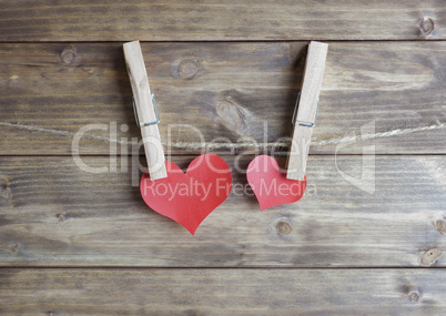 heart with clothespin hanging on a rope
