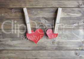 heart with clothespin hanging on a rope