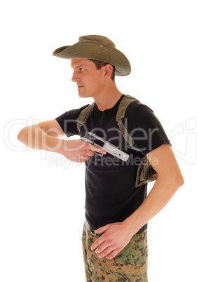 Soldier pulling his handgun.