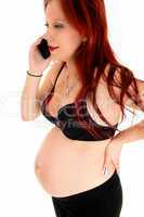 Pregnant woman on call phone.