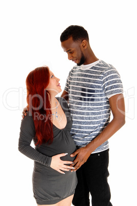 Pregnant woman and husband.