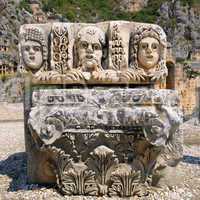 masks and Lycian tombs in the Myra, Turkey
