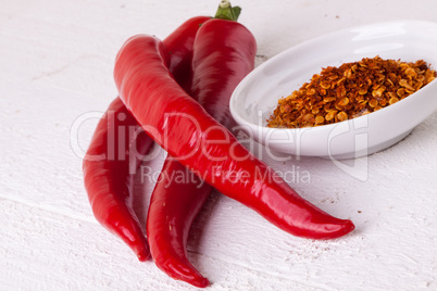 Fresh red and yellow chili peppers with spice
