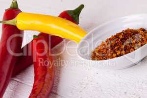 Fresh red and yellow chili peppers with spice