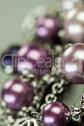 Attractive shiny purple beads on jewellery