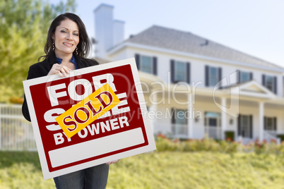 Female Holding Sold By Owner Sign In Front of House