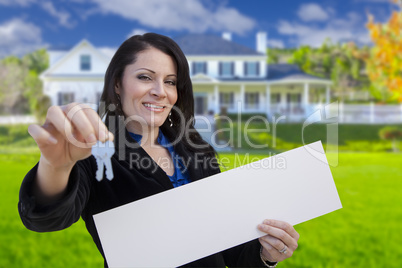 Woman Holding Blank Sign and Keys In Front of House