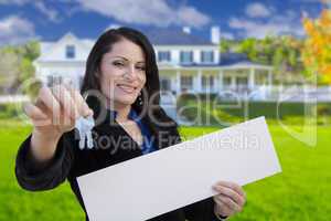 Woman Holding Blank Sign and Keys In Front of House