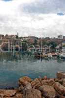 Digital painting of colorful fishing boats in harbor