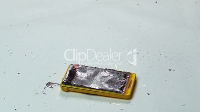 Destruction of a Cell Phone with a Hammer, close-up