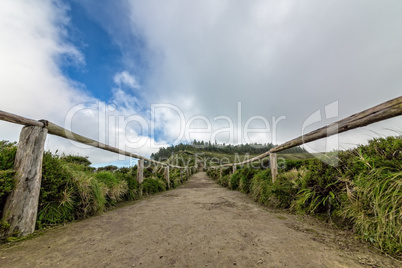 Footpath with Railing in Mountains