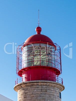 Red Lighthouse on the Background of Blue Sky