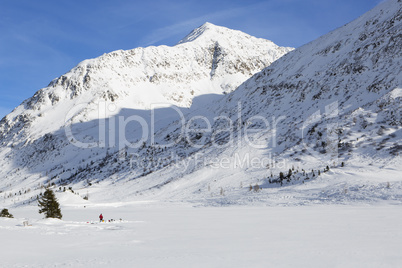 Ice diving at a frozen lake in the Austrian Alps