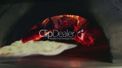 Pizza Cooking Baking In Italian Restaurant Kitchen Wood Oven Fire