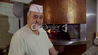 Man Working Cook Making Pizza In Italian Restaurant Kitchen Italy