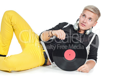 Male with headphones and vinyl