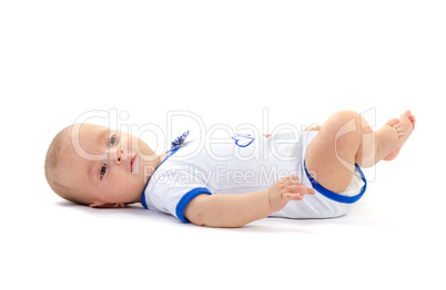baby boy lying on white floor