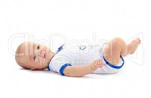baby boy lying on white floor