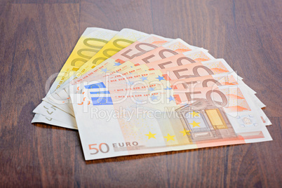 Close-up of Euro banknotes on the table