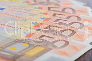 Close-up of 50 Euro banknotes on the table