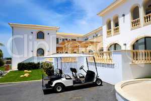 The electric cars for tourists transportation at luxury hotel, C