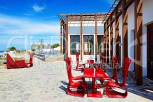 The outdoor restaurant near beach at luxury hotel, Crete, Greece